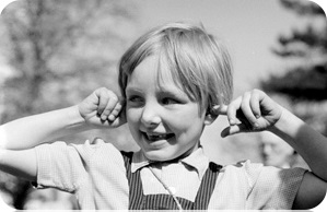 Child covers his ears.
